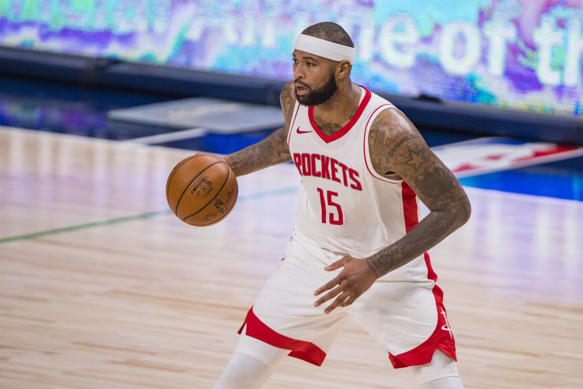 Jan 23, 2021; Dallas, Texas, USA; Houston Rockets center DeMarcus Cousins (15) looks to pass the ball during the second half against the Dallas Mavericks at the American Airlines Center. Mandatory Credit: Jerome Miron-USA TODAY Sports